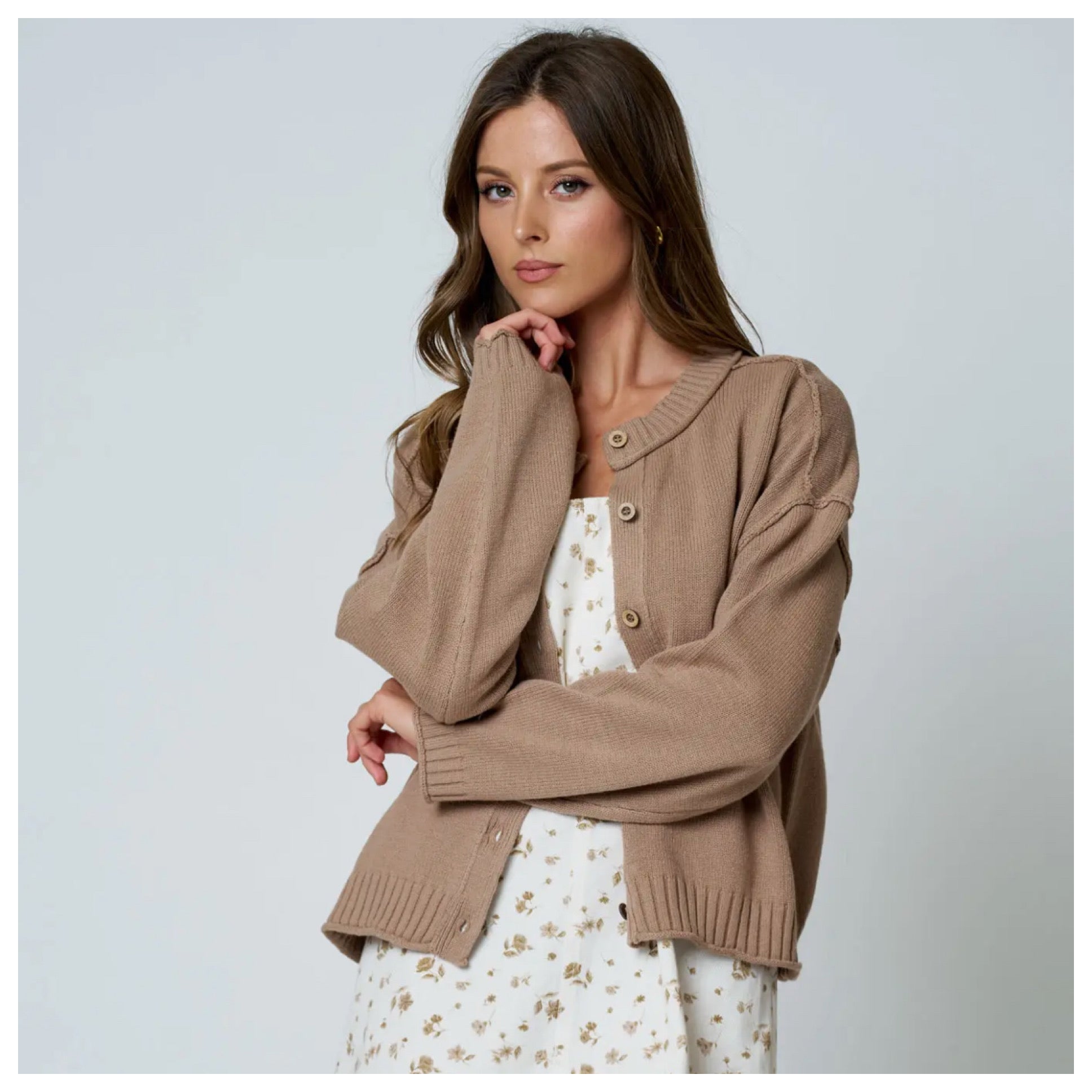 Raw edge exposed seam button down knit cardigan