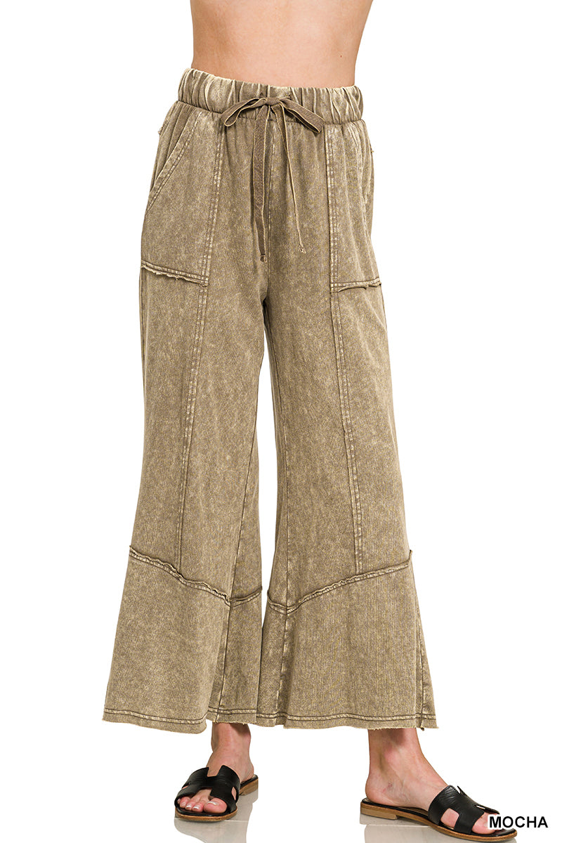 Exposed seam flare hem pants with pocket