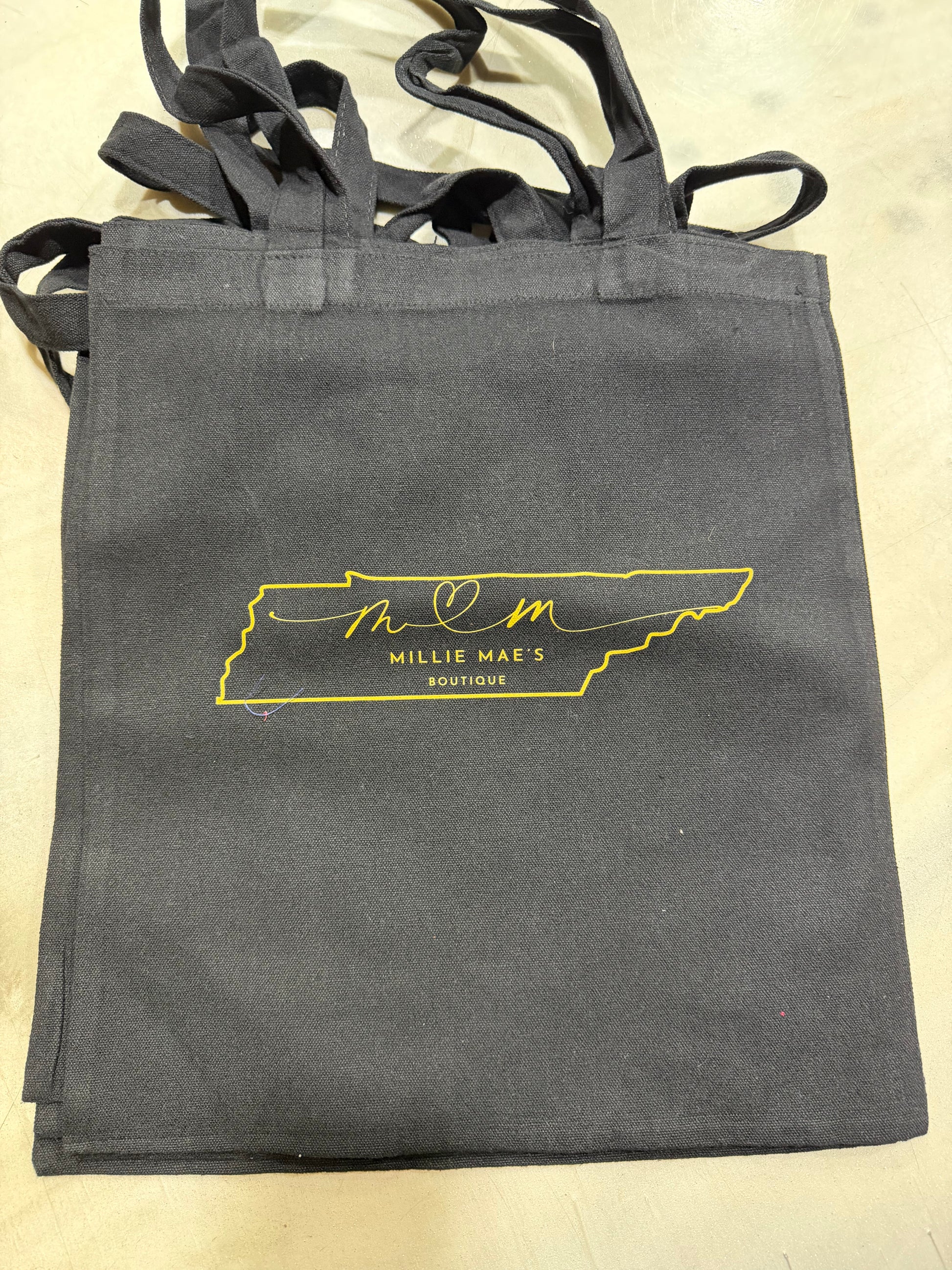 Millie Mae’s Canvas black and gold bag
